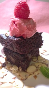 Double Chocolate Flourless Superfood Brownies topped with raspberry sorbet